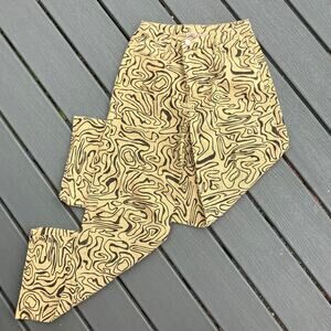 Tan high rise wide leg jeans with swirls, indie bohemian groovy artsy